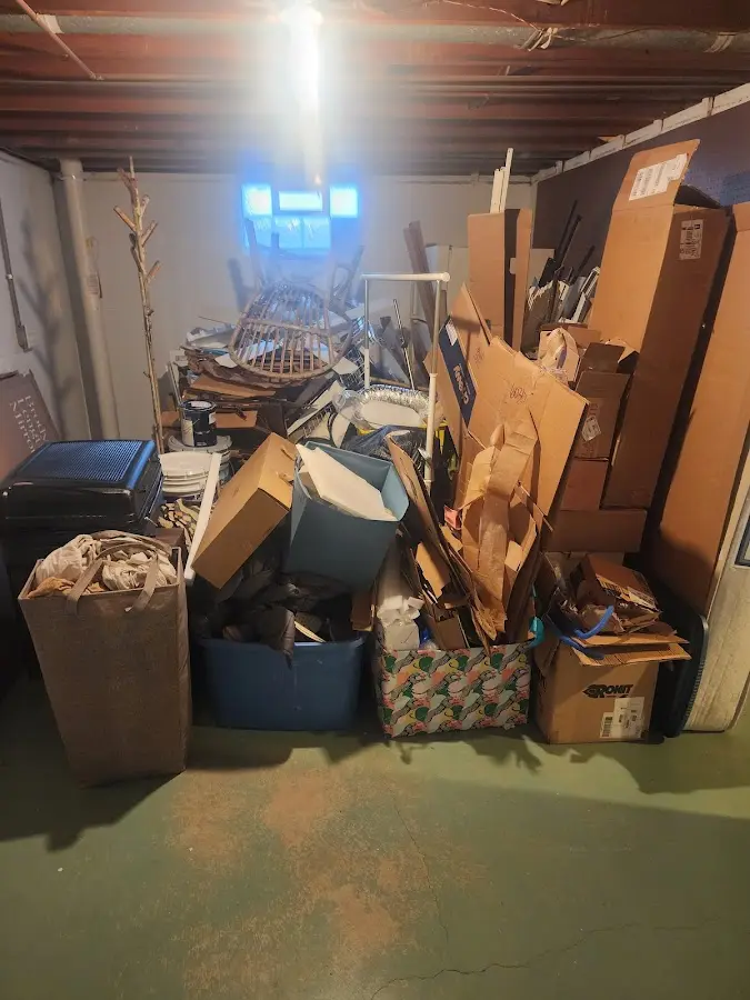 Roll-off dumpster container at job site for 20 Yard Dumpster Rental in Hollis